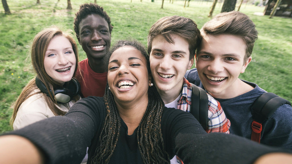 Teens taking a selfie